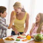 Mother And Children Prepare A meal,mealtime Together