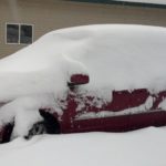 Michigan March Winter Snow Storm 2012 My vehicle buried in 15-18 inches of fresh snow. I can drive home. Ha! Ha! I got stuck at the bottom of the driveway.